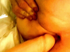 Dildo play just getting loose up before a male and female show up to play