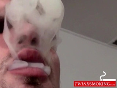 Inked skinny dude smoking & shooting cum on the floor