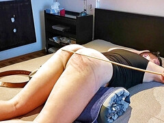 Spanking on my bed.
