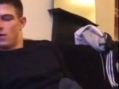 Cute guy jerks his big cock off