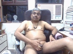 Middle-aged Dr. Kamesh gives himself a handjob with a soothing Indian body massage