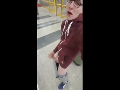 He strokes and ejaculates in a entrance hall