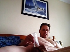 Wanking with toy