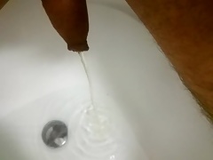 Me pissing in bathtub