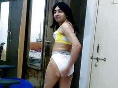 Dirty sissy crossdresser femboy Sweet Lollipop in a sports bra and thong.