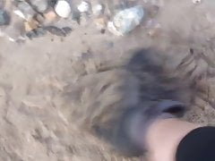 kicking red tartan skirt at the beach