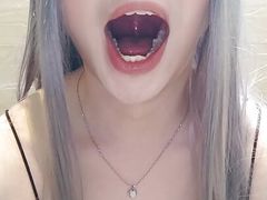 Femboy sucks on dildo and deepthroats it