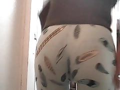 Showing off ass and pissing
