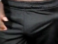 Large-Headed Black Manmeat in Cutoffs