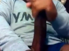 Hunk Strokes His Big Black Cock to Porn and Cums Twice
