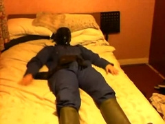 nip clamp ache in a boilersuit and sensory deprivation hood