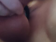 lying in bed riding a dildo in my asshole