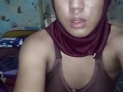 Sexy hijab femboy wearing bikini and playing cock on the bed