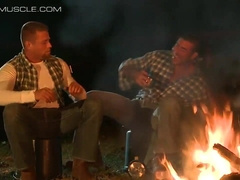 STRAPPED MUSCLE JOCKS - Bulky cowboy gets strapped up to the front of a van (Tyler Saint)