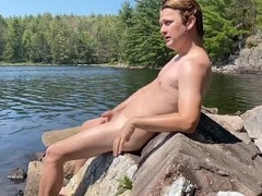 Relaxed Canadian guy Aaronthekayaker discovers a hidden lakeshore and slowly strips out of his trunks