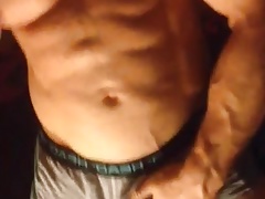 BODYBUILDER PLAYING WITH HIS SMALL COCK