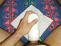 Wanking with tenga deep throat cup.