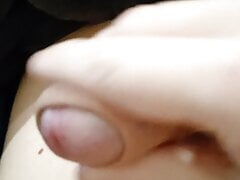 Guy jerking off uncircumcised cock on the table