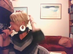 two nice clothed crossdressers in a blowjob-clip