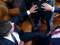 The hustlers wear business suits and have a wild affair