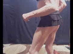 Bottom boy wearing a super short mini-skirt