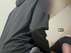 secretive man licking a young boy on the fire break away.