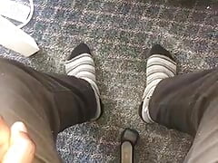 Young African feet out in socks in the office