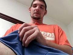 Amateur hunk pulls his cock out to tug on it
