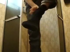 Slim guy strokes in shower