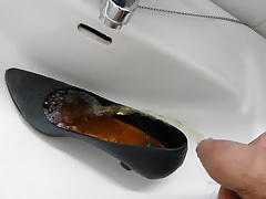 Piss in co-workers high heel