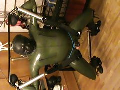 Green and green - swinged rubberslave with electro