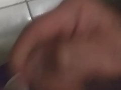 masturbating and cumming in the bathroom of bus station