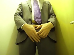 Standing jerk off in suit
