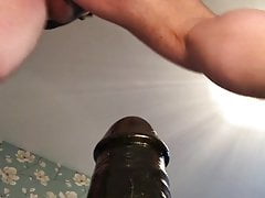 Big black dildo fuck in body suit