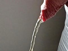 Uncut foreskin peeing
