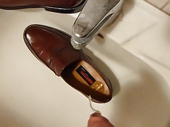 Piss in men's dress shoe