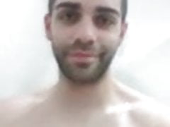 Spaniard man taking a shower