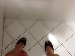 Wearing high heels mules and cum against the wall