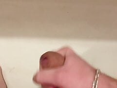 18 year old young guy masturbates his big cock at a party