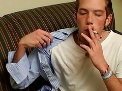 Naughty twink smoking solo before stripping nude and jerking off