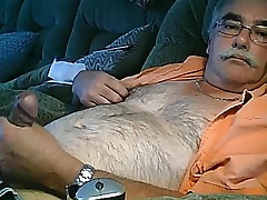 Hairy daddy wanking on cauch