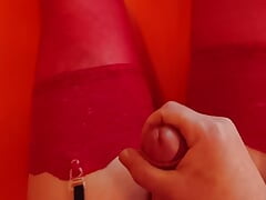 In black bodice and red stockings horny cummed