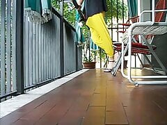 Pleasure on the balcony with Black high-heeled sandals