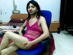 Sexy sissy crossdresser in cute pink babydoll with thong