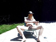 Estim nude out on deckchair balls-nipples pinched by hangers