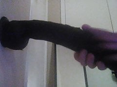 Sandie takes the 16 inch Black dildo
