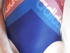 Small cock cum on Adidas swimsuit