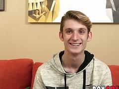 Cute blonde twink strips after an interview and masturbates solo