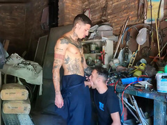 Sexy mechanic sticks the dick in the guy's mouth and fucks him like a bull