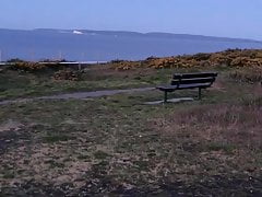 Sitting on a park bench at sunrise